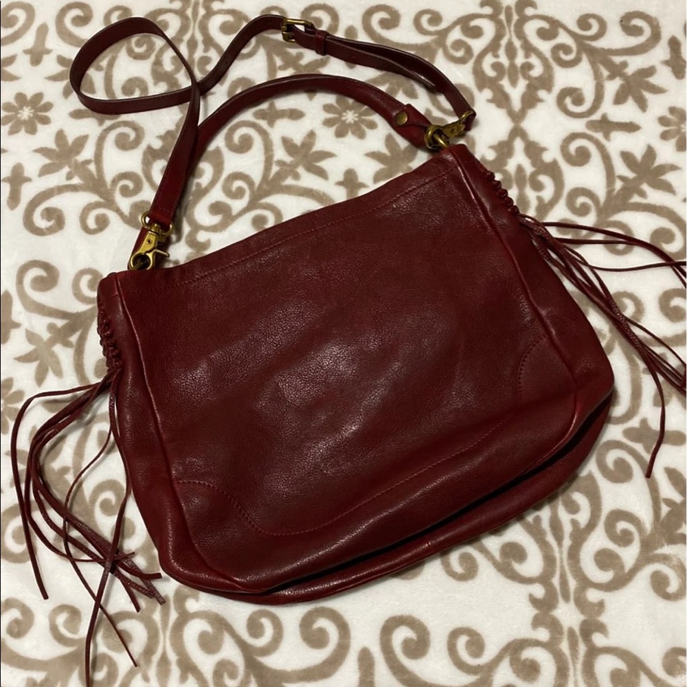Burgundy Frye handbag with magnetic closure